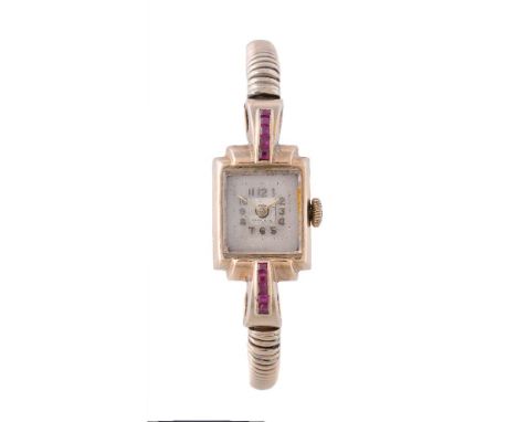 A lady's 9 carat gold and synthetic ruby dress watch, hallmarked London 1948, Marvin manual wind movement, 17 jewels, silvere