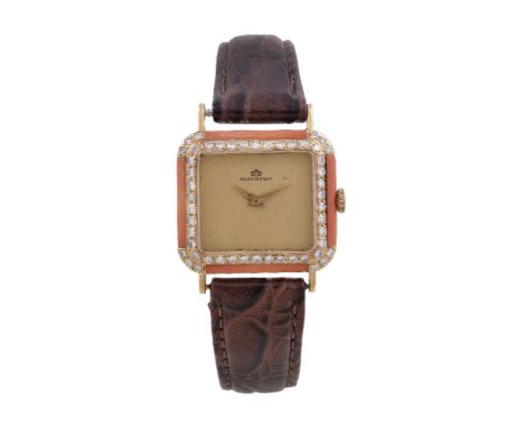 ϒ Bucherer, ref. 908, a lady's 18 carat gold, coral and diamond wristwatch, no. 300801, manual wind movement, 17 jewels, cal.