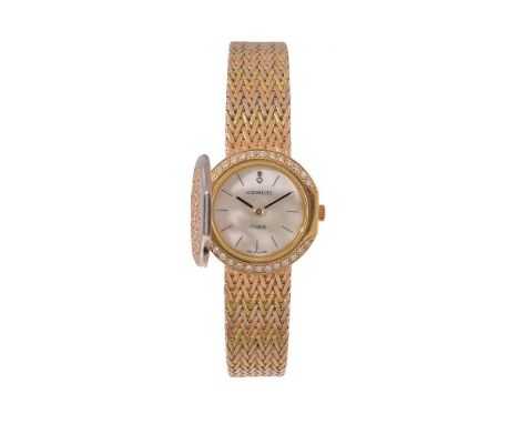 ϒ Corum, ref. 373885, a lady's gold and diamond bracelet wristwatch, no. 42563.63P83, quartz movement, 7 jewels, cal. 202484,