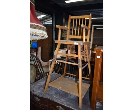 A vintage wood frame childs metamorphic high/low chair