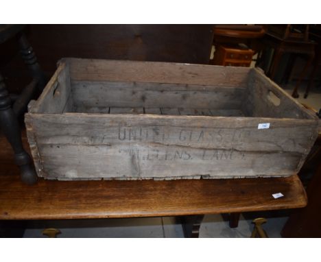 A vintage wooden crate, stamped for United Glass Ltd, Lancaster
