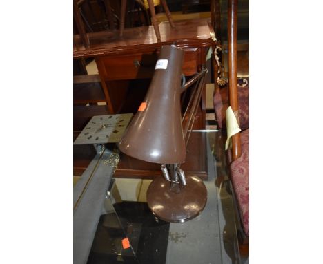 A vintage angle poise lamp, in brown