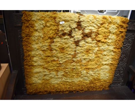 A vintage wool/nylon rug labelled St Michael (Marks &amp; Spencer) , approx. 91 x 152cm