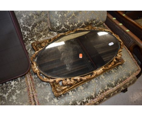 A vintage gilt frame oval mirror and a gilt picture frame
