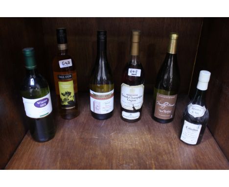 ADDENDUM - NOT IN CATALOGUE A bottle of Harvey's Grande Champagne Cognac, half bottle of Calvados reserve 6 ans, and four bot