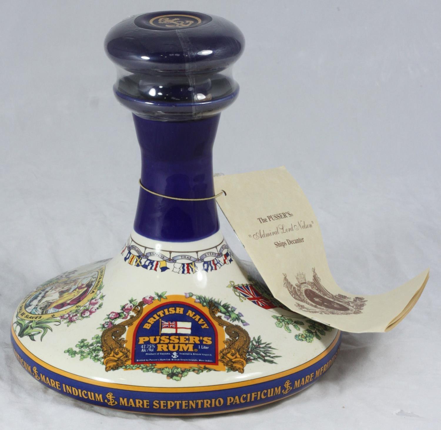 A Wade ships decanter with full Pussers rum contents