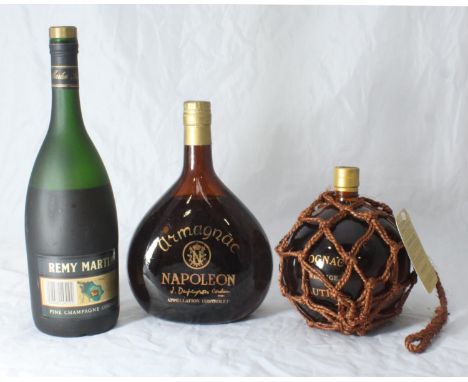 A 1 litre bottle of Remy Martin VSOP Cognac, together with Cognac Gautier Fisher Ball and Armagnac Napoleon (all boxed) 