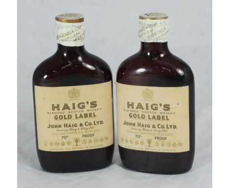 Two small pocket-flask size bottles of Haig Gold Label Blended Scotch Whisky, 70% proof, 1950s or 1960s, with foiled spring-t