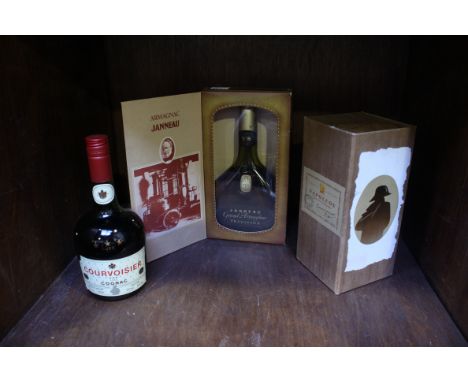 ADDENDUM - ONLY THREE BOTTLES NOT FIVE AS CATALOGUED.&nbsp; A 1950s bottle of Courvoisier Old Liqueur Cognac (original tissue