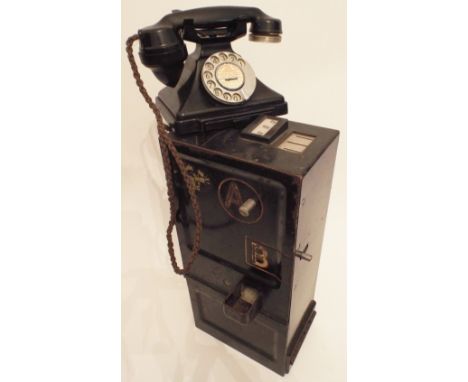 An A B button telephone coinbox,circa 1950, Now with decimal slots for 2p, old 5p and 10p, in black painted case; with a 200 