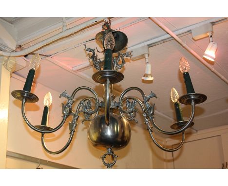 A silverised chandelier light fitting of six branches decorated with dolphins and mythical creatures (a/f - must be tested by