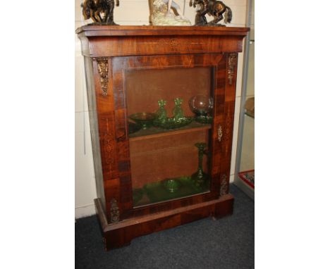 A 19th century inlaid rosewood and gilt pier cabinet with glazed panel door enclosing shelf, on bracket base, 76cm