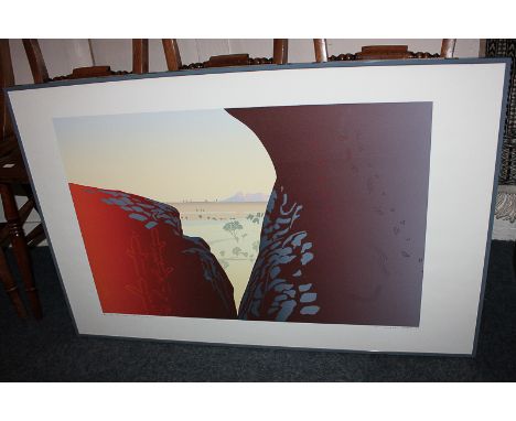 Malcolm Warr (b.1939) Australian landscape, Ayers Rock, 'The Real World, Uluru', limited edition colour print 89/99, 50.5cm b