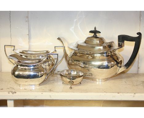 A Walker & Hall, Sheffield, silver plated three piece tea set and strainer together with a silver plated rectangular tureen a