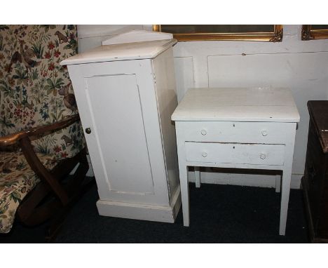 A white painted bedside cupboard with panel door and shelf, 39cm, together with a white painted sewing table with hinged lid