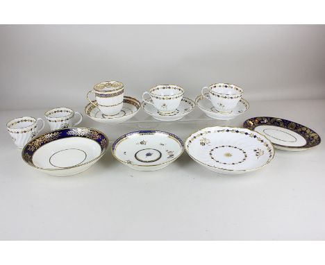 A collection of 18th and early 19th century cobalt blue and gilt porcelain, white ground, comprising two spiral fluted Barr F