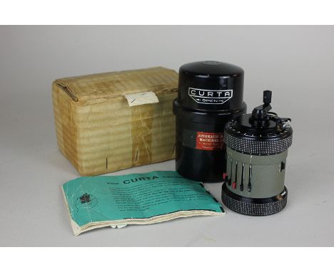 A Curta Type II calculator, No 556241, by Contina Ltd Mauren System Curt Herzstark, in black canister, boxed with instruction