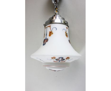 A ceiling light fitting with Art Deco style glass shade, with current electrical safety test label