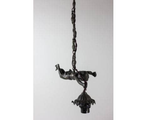 A bronze light fitting modelled as a semi-nude female figure (a/f - no shade and needs testing by electrician), 22cm