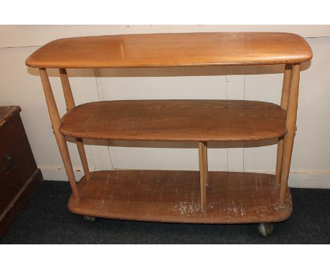 An Ercol light elm three-tier open shelf unit, circa 1960, 91cm