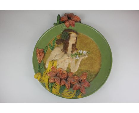 Ernst Wahliss, an Art Nouveau ceramic wall plaque modelled in relief of a nude amongst flowers, impressed maker's marks, 45cm