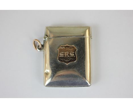 A Victorian silver vesta case with 9ct gold monogrammed cartouche and chain ring, maker Henry Matthews, Birmingham 1895