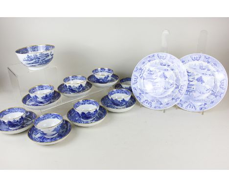 A set of eight gilt edged porcelain tea bowls and saucers decorated with a willow pattern variation, and a similar bowl, toge