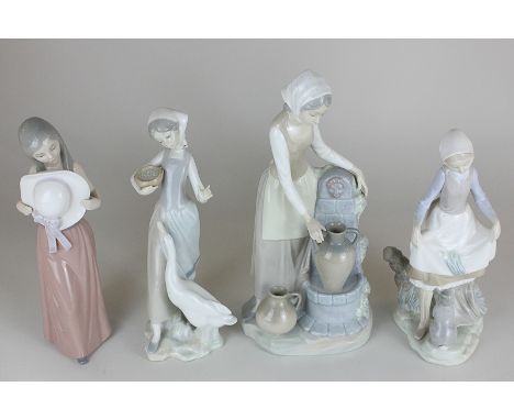 Three Lladro porcelain figures of girls (a/f), together with a Nao porcelain figure of a woman by a well