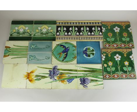 A small collection of Mintons and other Art Nouveau style ceramic wall tiles with tubeline decoration, including a set of fou