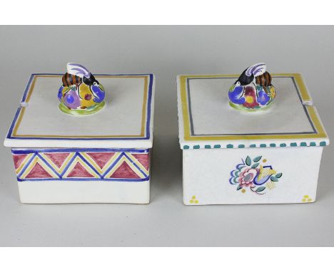 Two similar Art Deco Carter Stabler Adams Poole Pottery honeycomb boxes, both with bee finials, possibly by Harold Brownsword