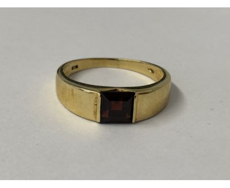 YELLOW METAL STAMPED 760 AND 1544 GARNET SET RING SIZE S 4.3G OVERALL