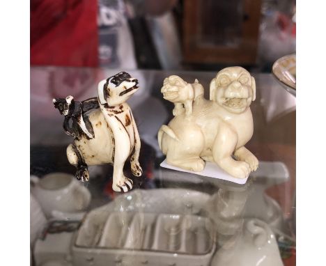 JAPANESE NETSUKE OF A DOG AND PUP AND A SHISHI AND PUP