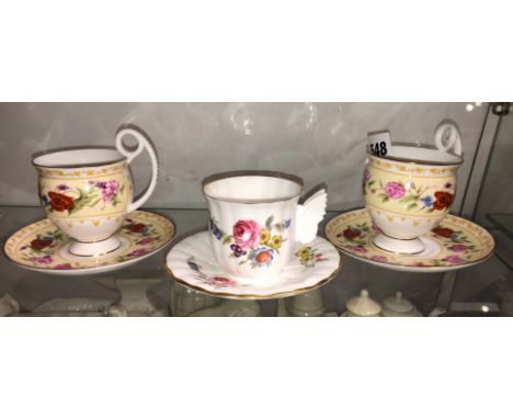 PAIR OF ROYAL WORCESTER CABINET FLOWERS TEACUPS AND SAUCERS, AND A ROYAL WORCESTER CUP AND SAUCER