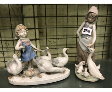 LLADRO 26 FIGURE OF A GIRL FEEDING GEESE AND A LLADRO STYLE FIGURE GROUP OF GIRL WITH GEESE