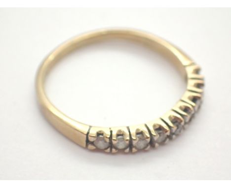 9ct gold  ring set with small diamonds size I