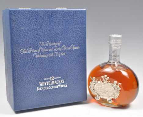 1 x bottle of White &amp; Mackay blended Scotch Whiskey De Luxe. Limited Edition to celebrate the wedding of The Prince of Wa