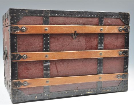 A rare 19th Century Victorian salesman miniature carriage trunk being metal and wooden strapped with brass drop handles to th