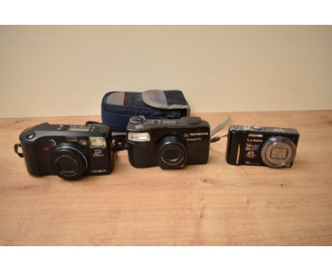 A Minolta Riva Zoom135EX  AF camera, an Olympus Superzoom 70 camera, and a Lumix Power OIS camera