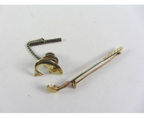 Two tone gold golf club brooch set with a pearl ball hallmarked 9ct and a 9ct gold salmon tie tack hallmarked Condition Repor