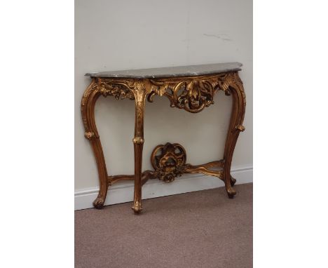 20th century carved gilt wood console table fitted with shaped grey marble top, W111cm, H82cm, D34cm Condition Report Click h