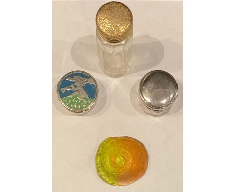 An enamel cherub top rouge pot; a silver top rouge pot; a gilt top scent; an opalescent shell paperweight 