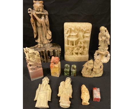 Chinese Soapstone - a Buddha, standing, playing an instrument, 27cm high; Shoulao, standing with a deer;  others;  similar se