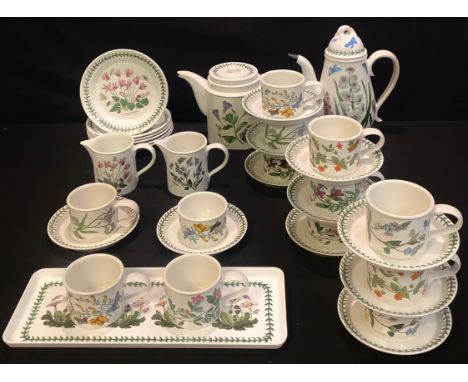 A Portmeirion Botanic Garden tea and coffee service comprising tea pot, coffee pot, cream jugs, side plates, cups and saucers