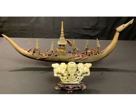 Asian Art - a Chinese carved horn dragon long boat, with figures, 66cm long; a carved soapstone vase (2) 