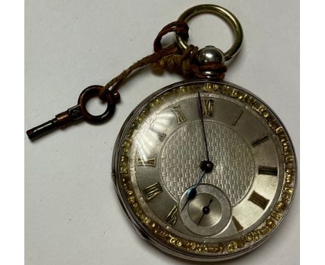 A Victorian silver open face pocket watch, with engine turned dial 