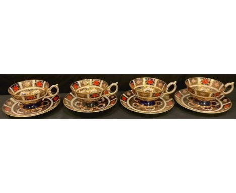 A set of four Royal Crown Derby Imari palette 1128 pattern teacups and saucers (saucers first quality, cups seconds) 