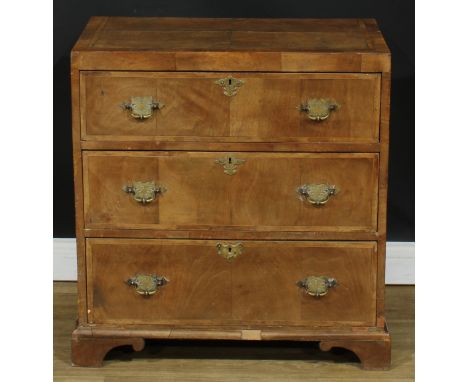 A George II Revival featherbanded walnut caddy top chest, of three long drawers, 75.5cm high, 75cm wide, 43cm deep 