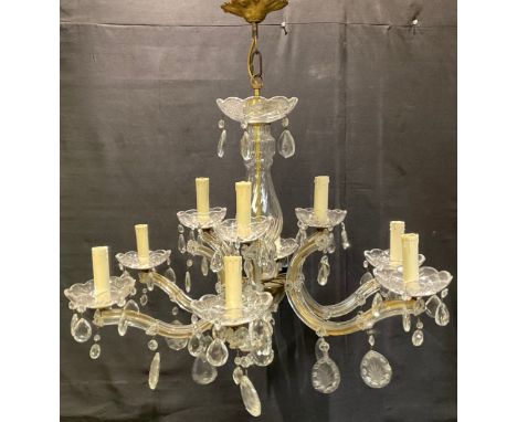 A cut glass and lacquered brass nine-light electrolier, multi-faceted droplets, 45cm high excluding fitting, 70cm wide 