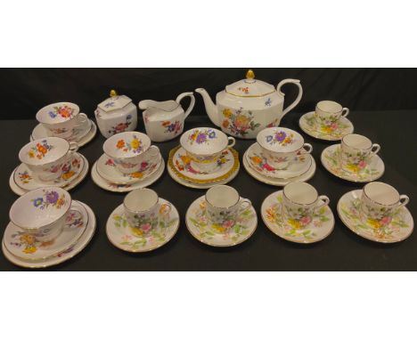 A Caverswall Summer pattern tea set comprising octagonal teapot, sucrier and cover, milk jug, five cups and saucers, six tea 