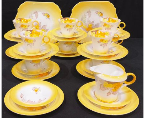 A Shelley Phlox pattern part tea service comprising cake plate, side plates, cream jug, cups and saucers 